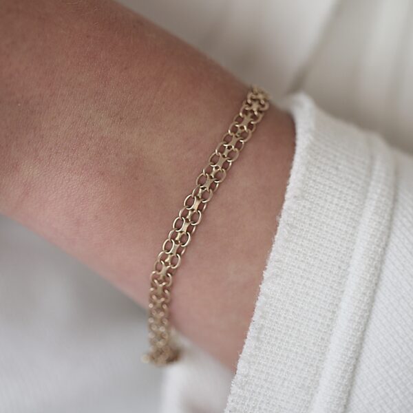 Armbånd i 18 karat guld (X-link)